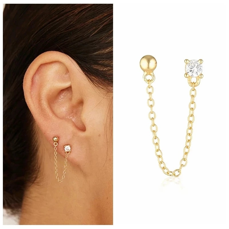 Boucles d’oreilles Double clous avec chaine