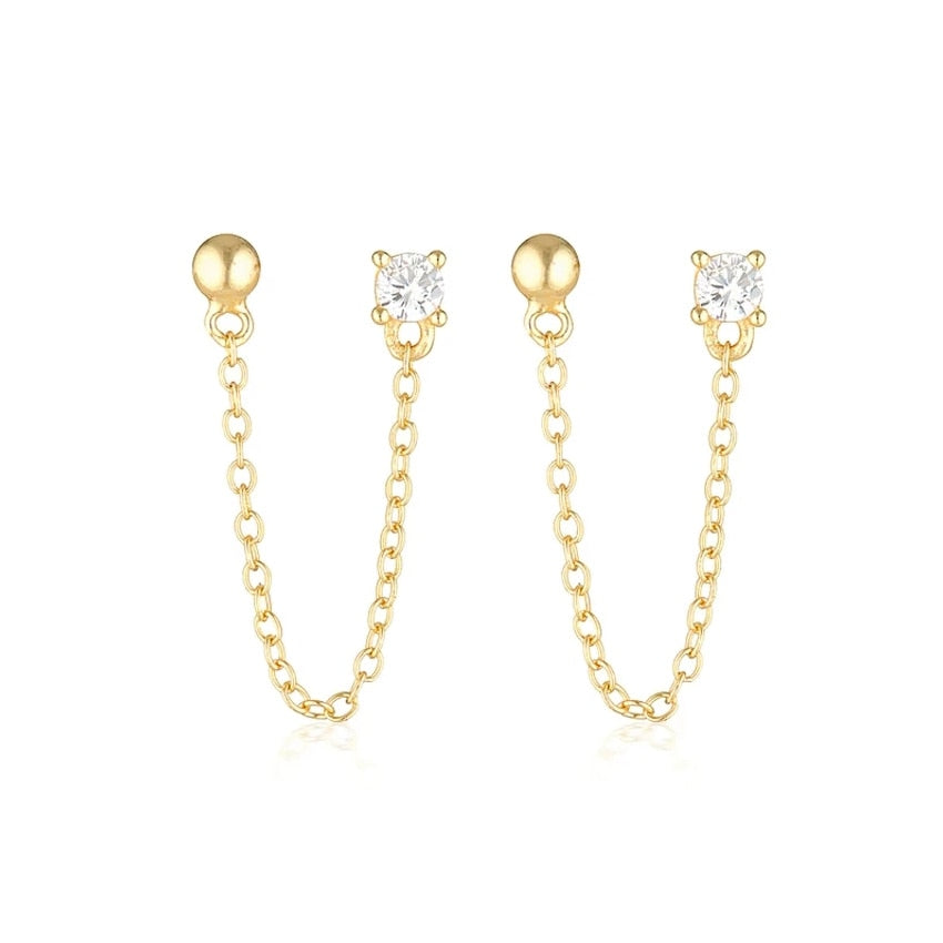 Boucles d’oreilles Double clous avec chaine